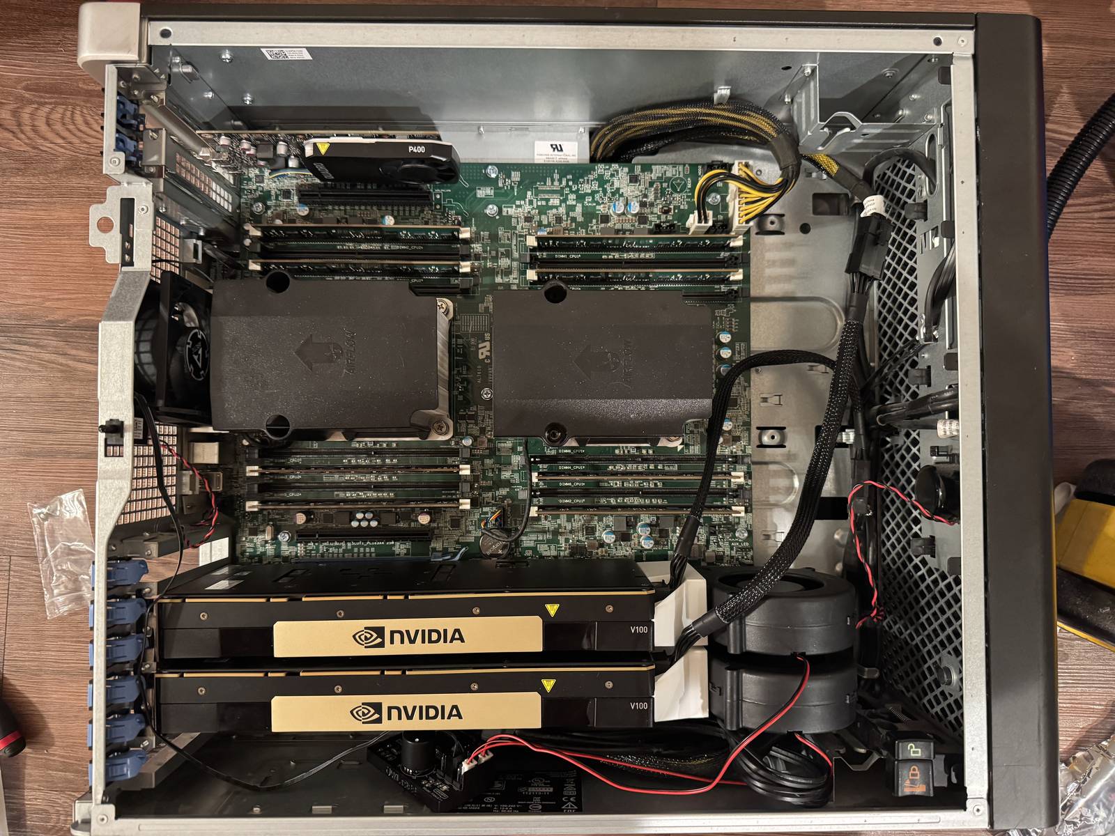 Two Tesla V100s and a Quadro P400 installed