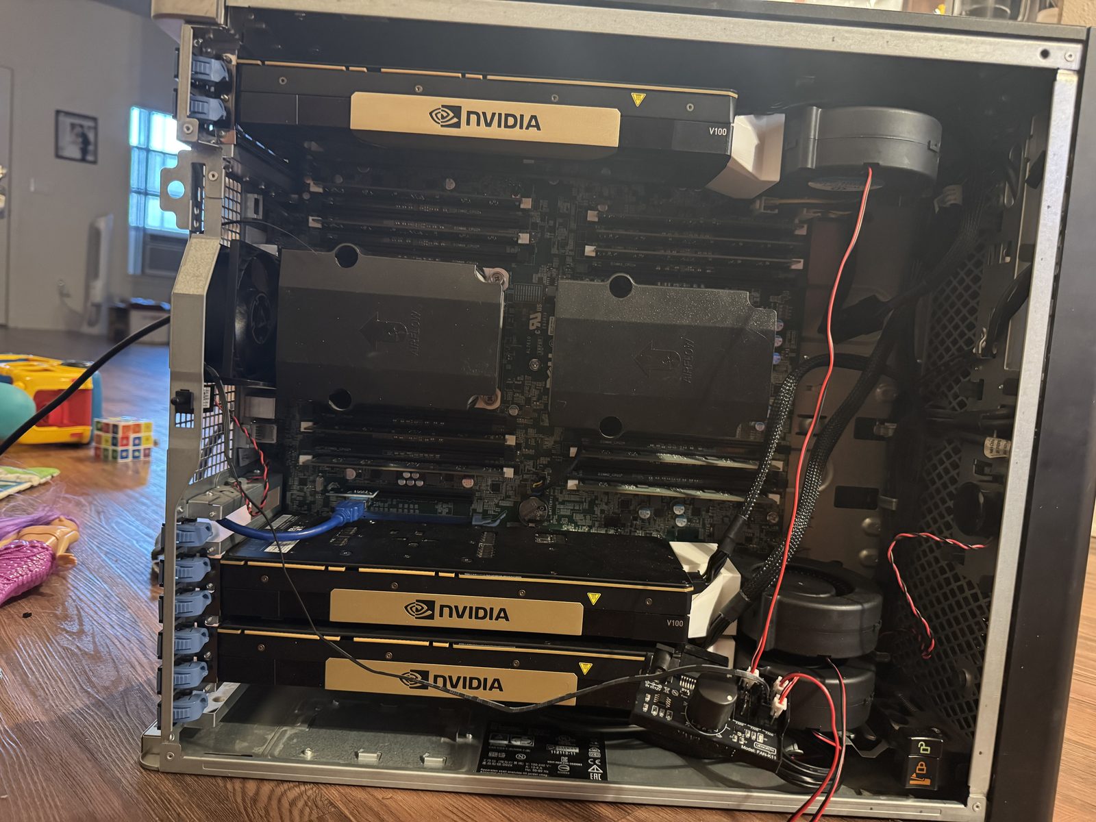Three V100s and the relocated P400